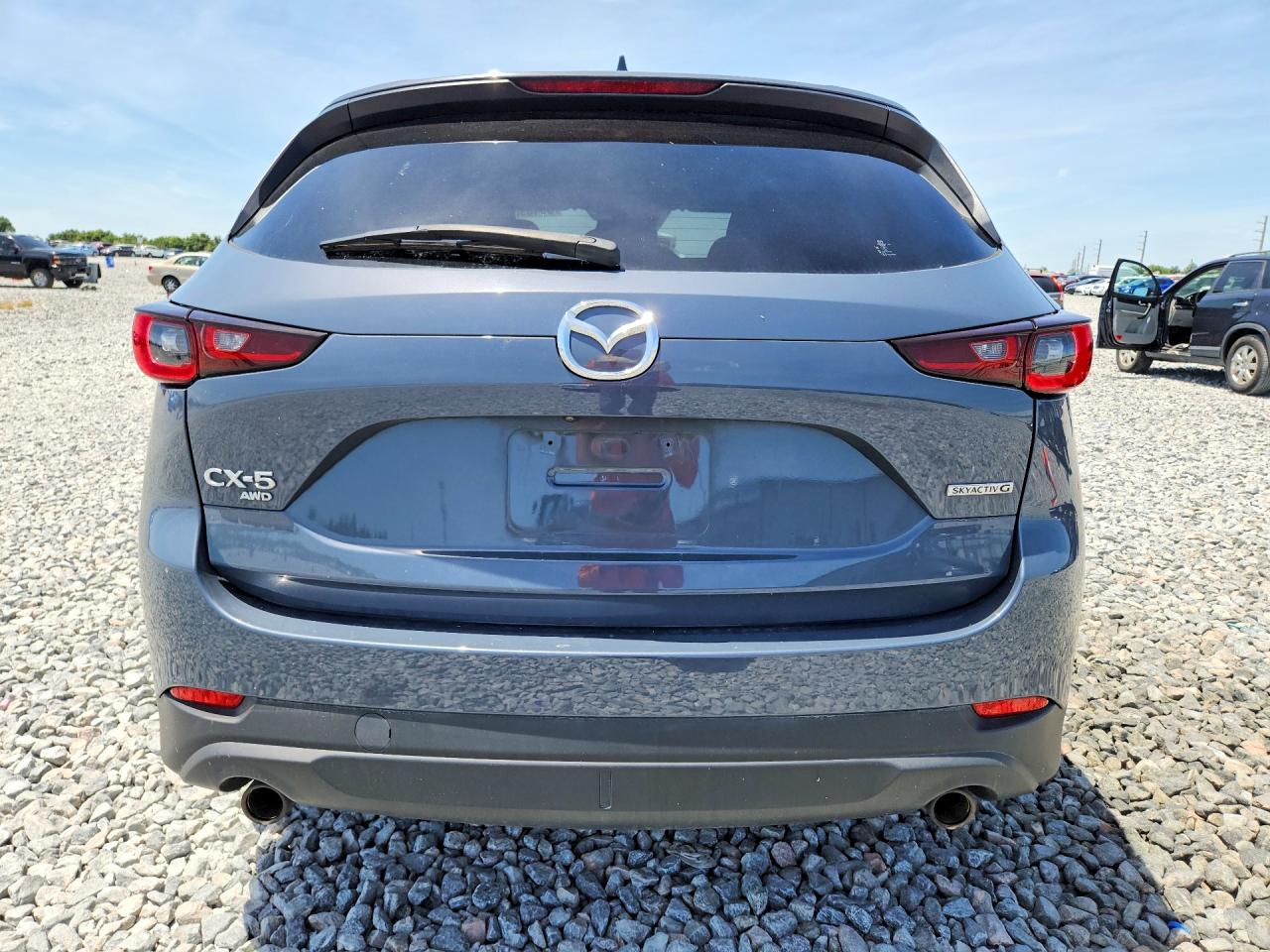 JM3KFBCM8P0139036 · 2023 MAZDA CX-5 · 6/13