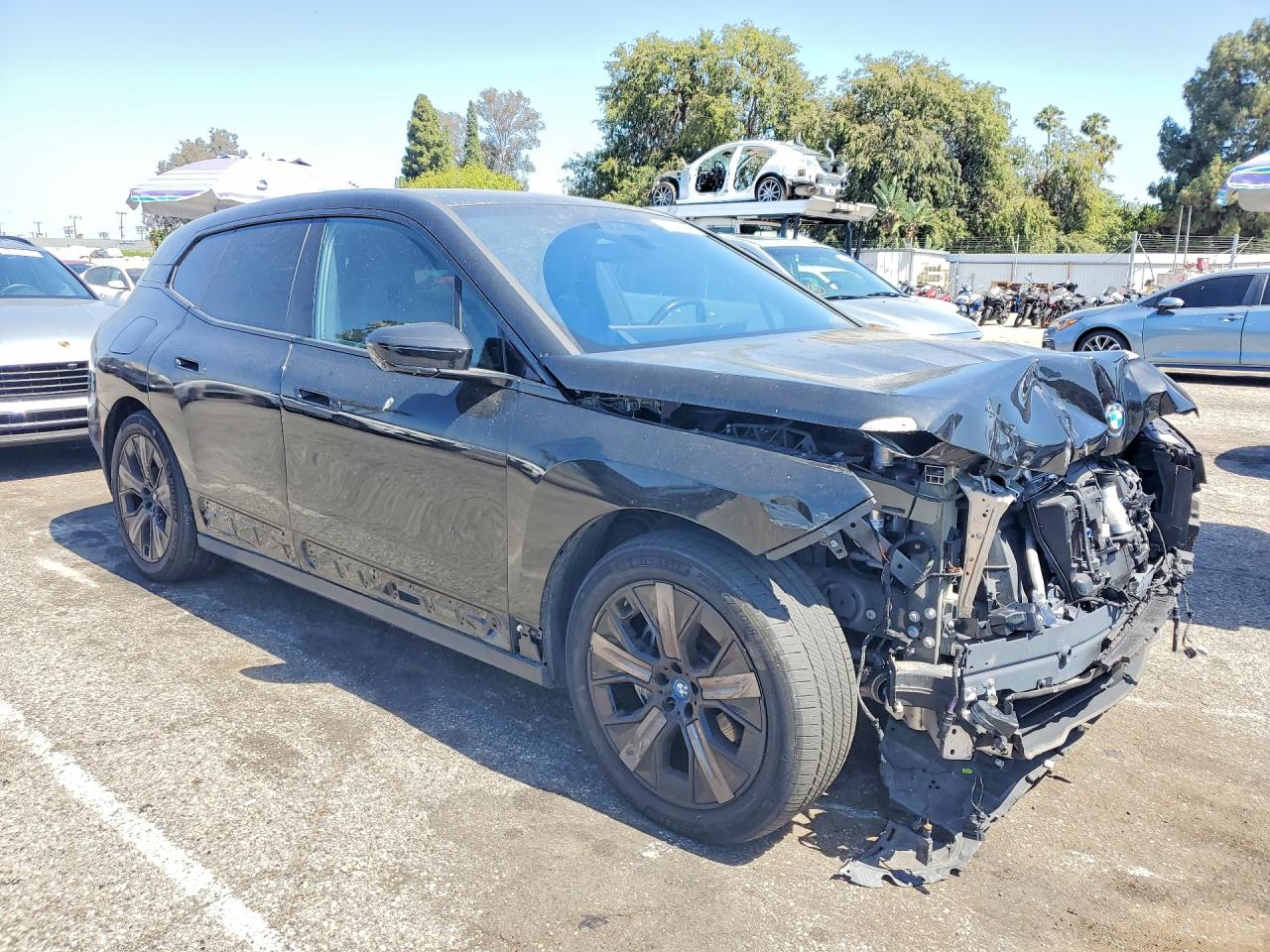 WB523CF03RCR27056 · 2024 BMW IX · 4/14