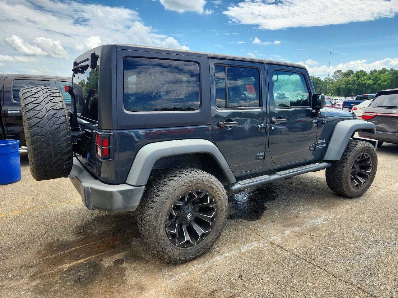 1C4BJWDG9JL831058 · 2018 JEEP WRANGLER UNLIMITED · 3/13