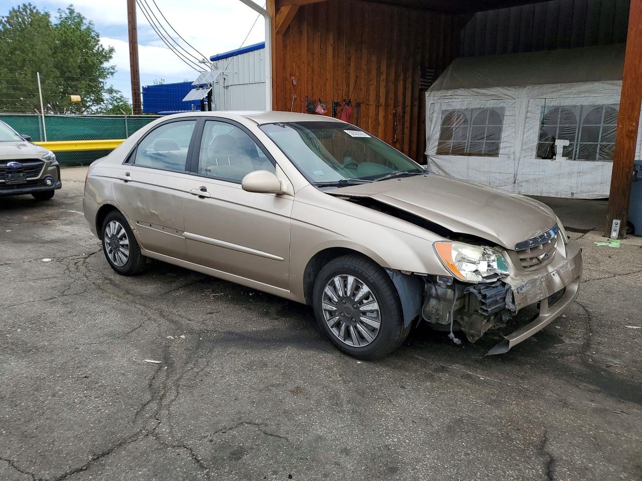 KNAFE121345060335 · 2004 KIA SPECTRA · 4/12