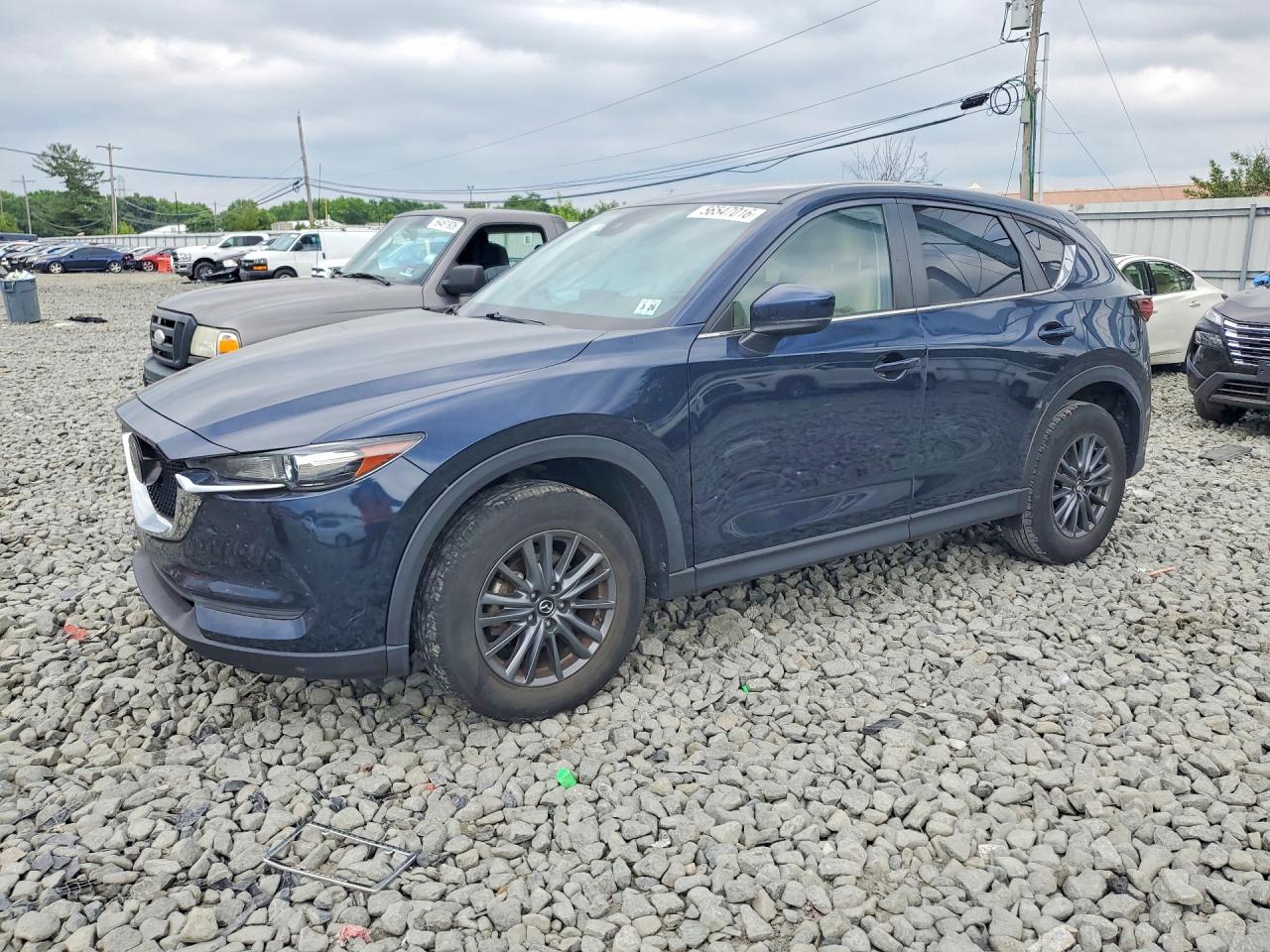 JM3KFACM7M0331733 · 2021 MAZDA CX-5