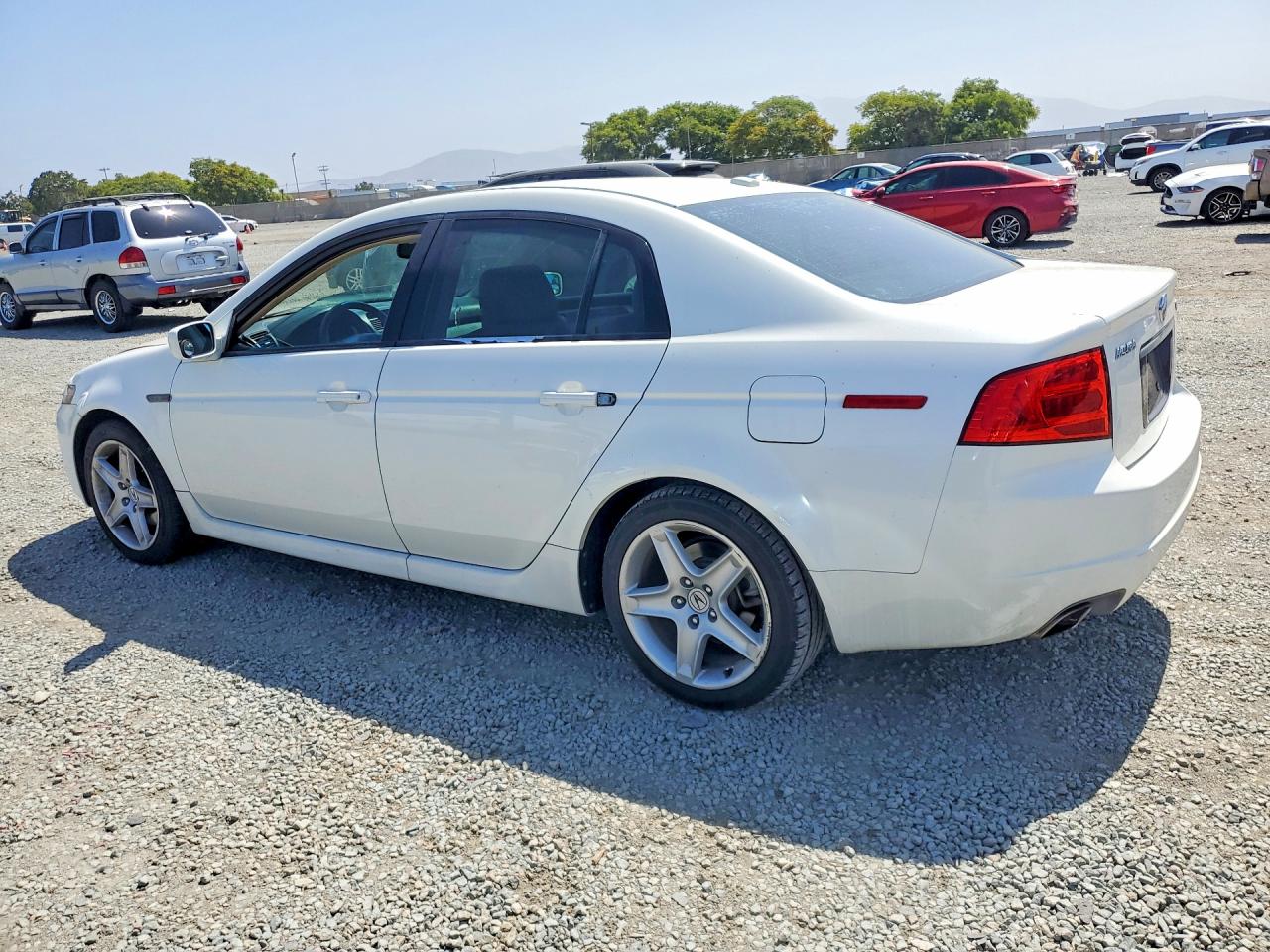 19UUA66215A055845 · 2005 ACURA TL · 2/12