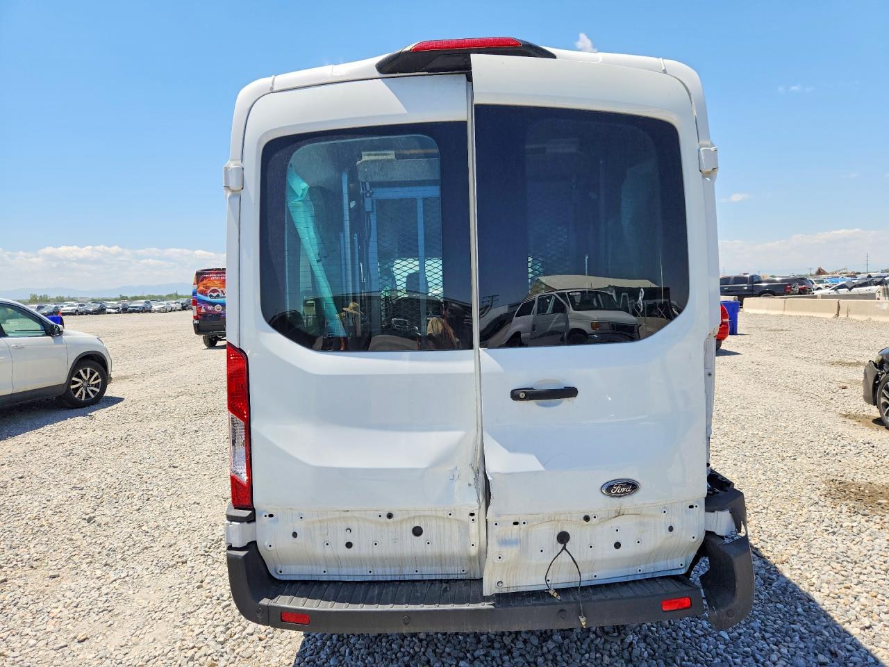 1FBAX2C85PKB79927 · 2023 FORD TRANSIT · 6/13