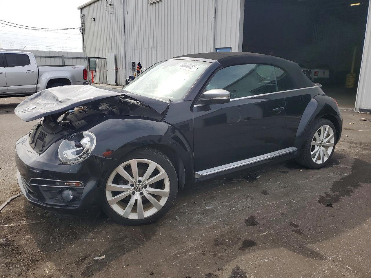 3VW517AT6EM818208 · 2014 VOLKSWAGEN BEETLE