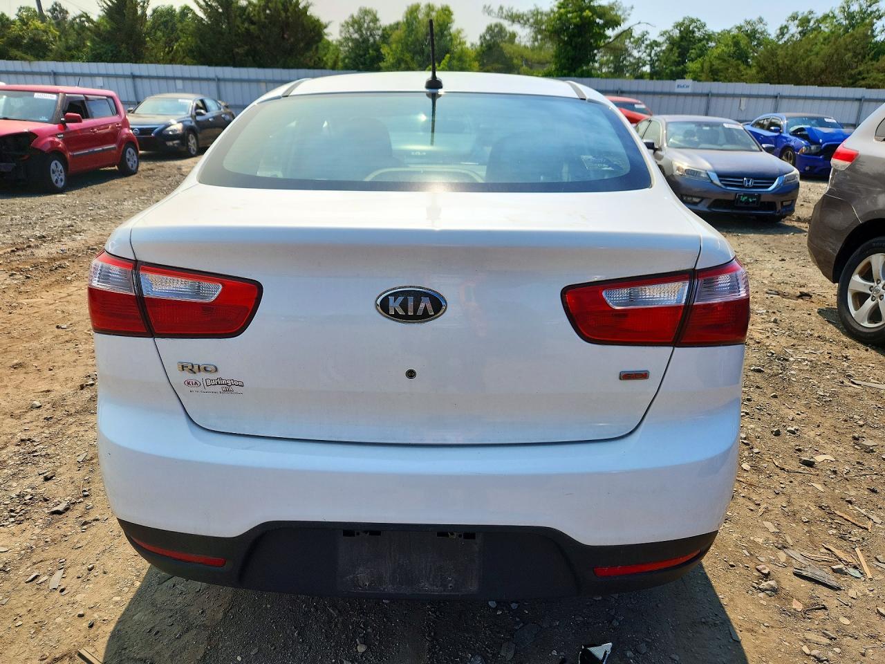 KNADM4A31D6229907 · 2013 KIA RIO · 6/12
