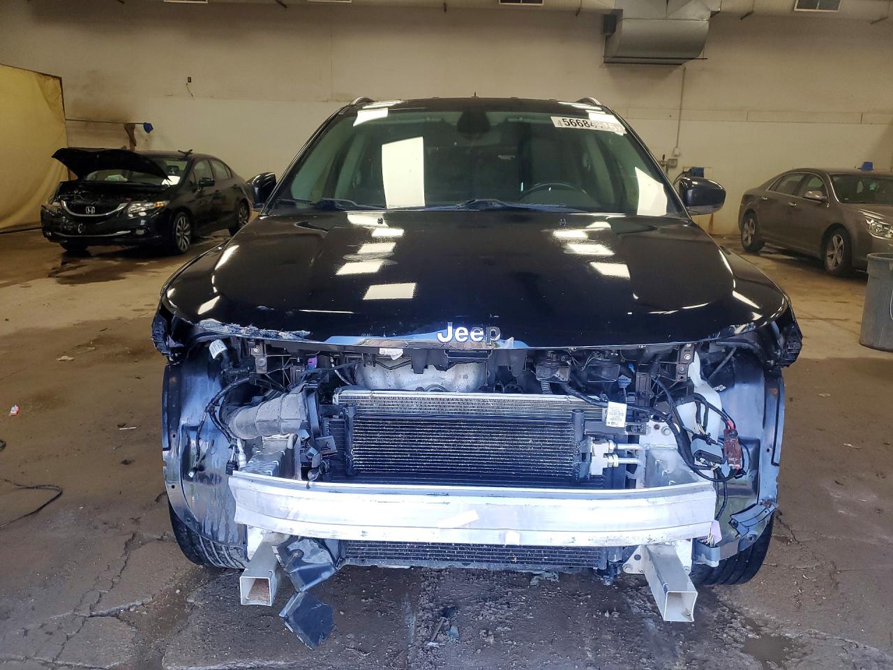 3C4NJDCB9JT434302 · 2018 JEEP COMPASS · 5/14