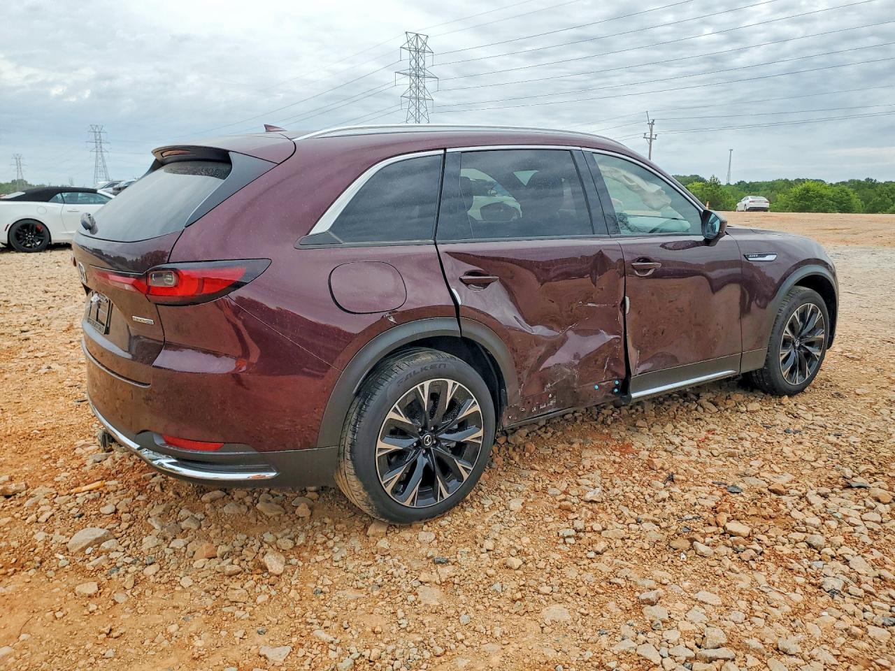JM3KKEHA8R1111584 · 2024 MAZDA CX-90 · 3/13