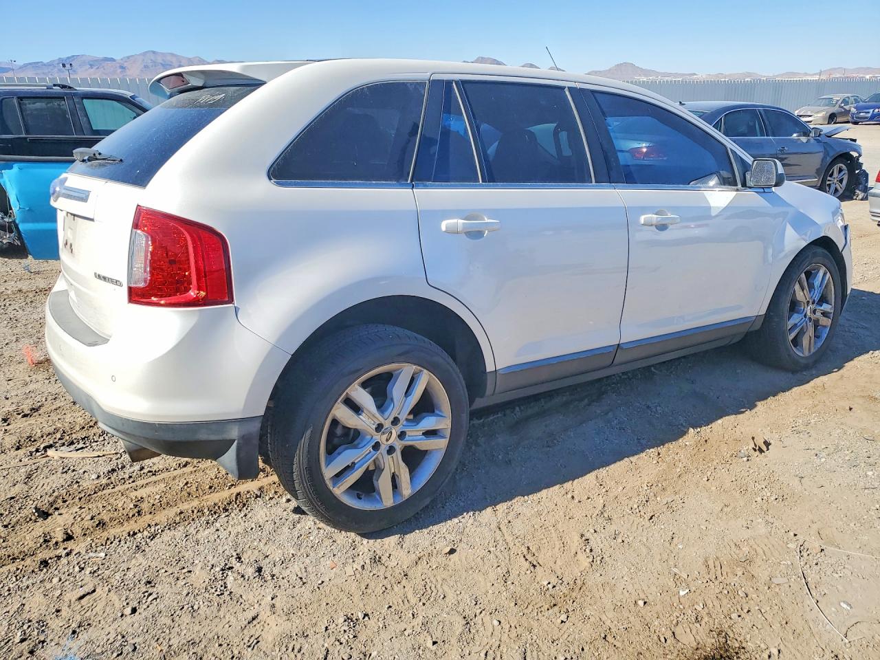 2FMDK3KC0BBB03954 · 2011 FORD EDGE · 3/14