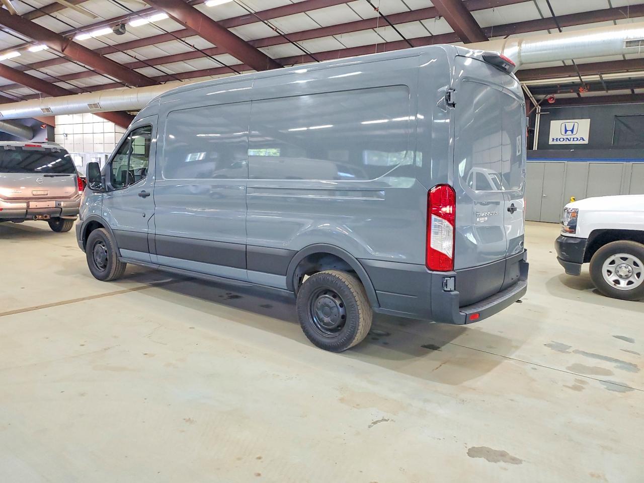 1FTBR1C84MKA48438 · 2021 FORD TRANSIT · 2/13