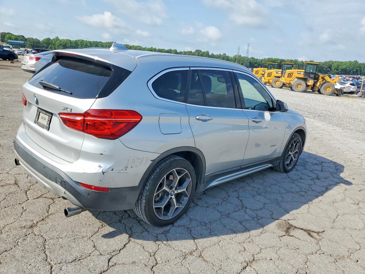 WBXHU7C30H5H34986 · 2017 BMW X1 · 3/12