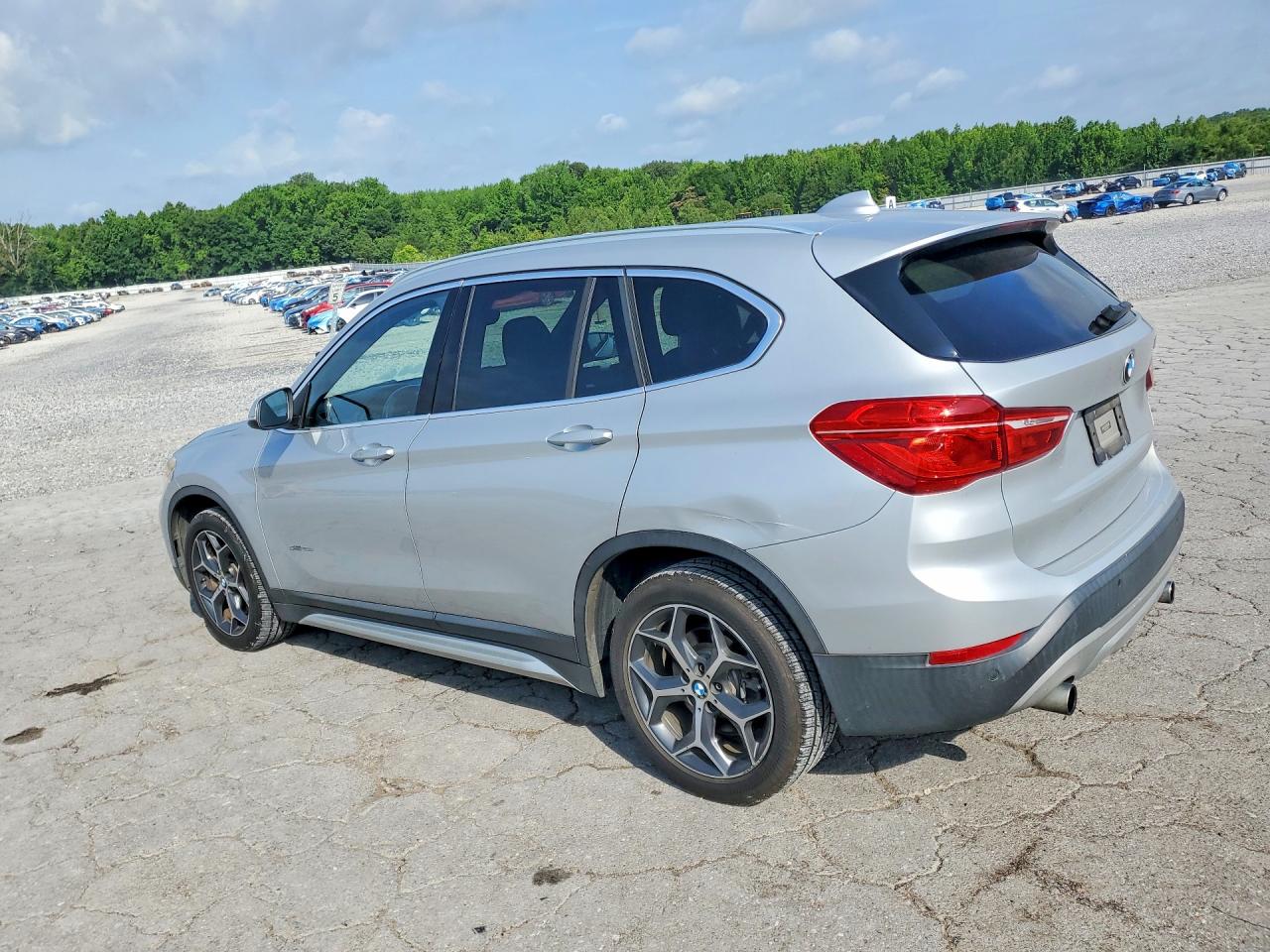WBXHU7C30H5H34986 · 2017 BMW X1 · 2/12