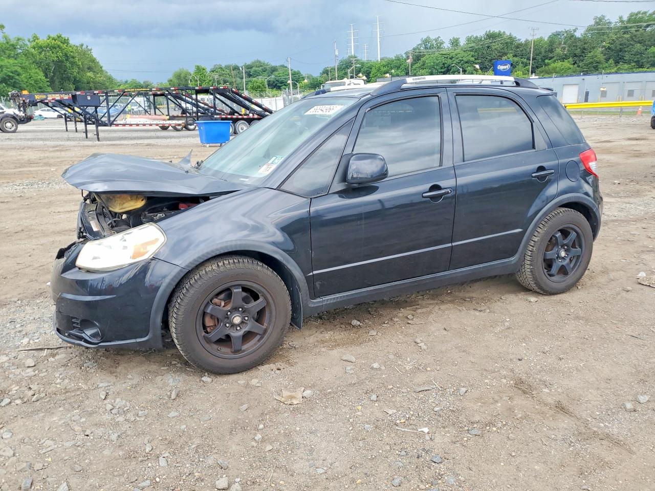 JS2YB417996200083 · 2009 SUZUKI SX4