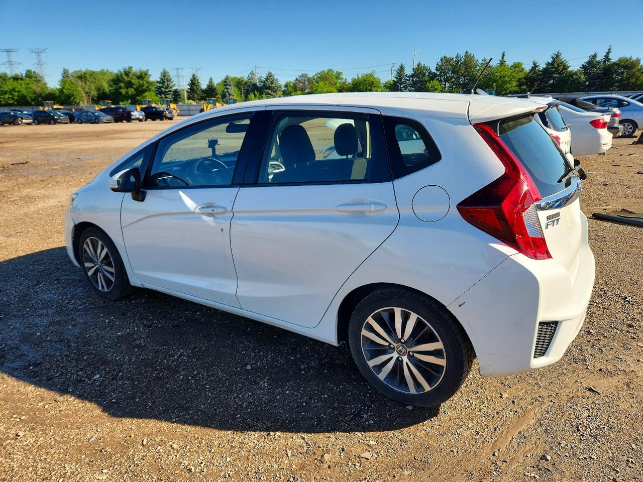 JHMGK5H76GX038291 · 2016 HONDA FIT · 2/12
