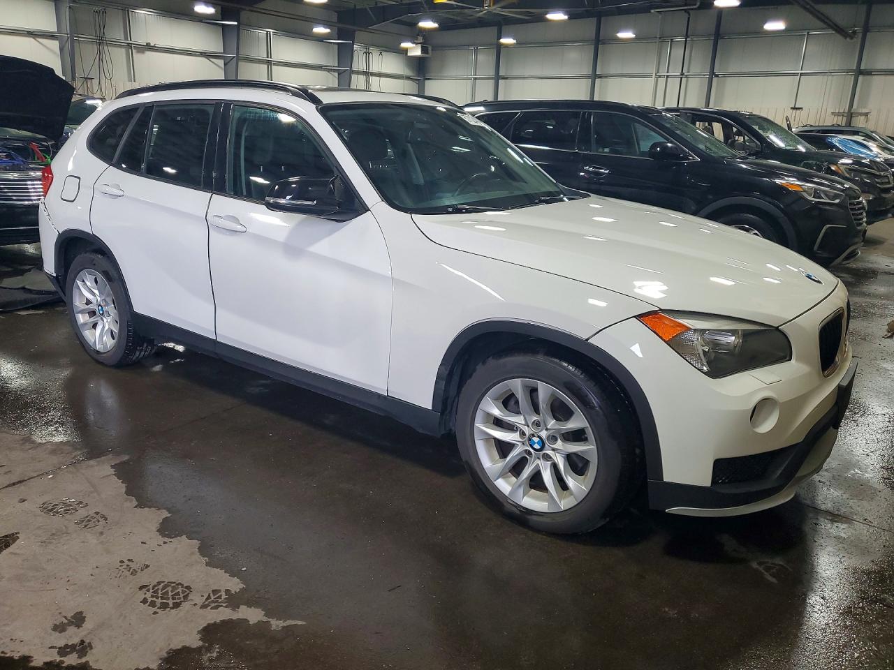 WBAVL1C52FVY31731 · 2015 BMW X1 · 4/13