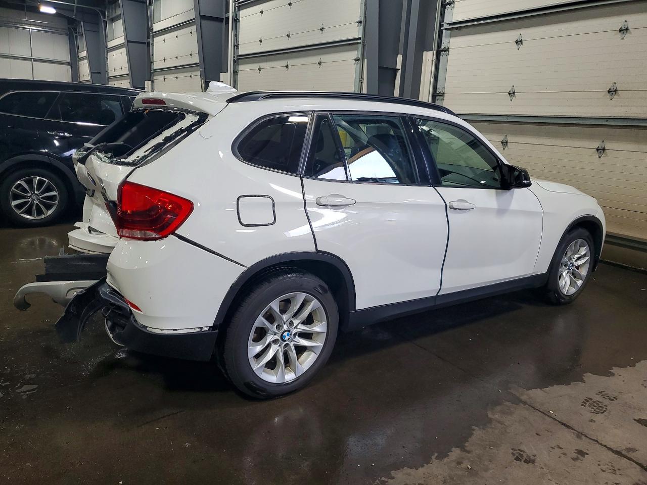 WBAVL1C52FVY31731 · 2015 BMW X1 · 3/13