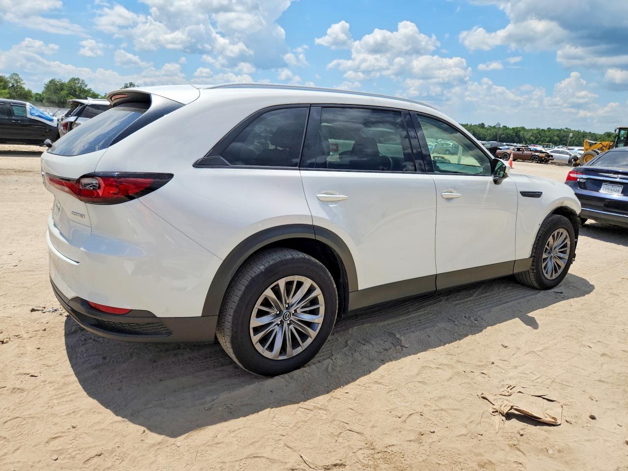 JM3KKBHD8R1136915 · 2024 MAZDA CX-90 · 3/14