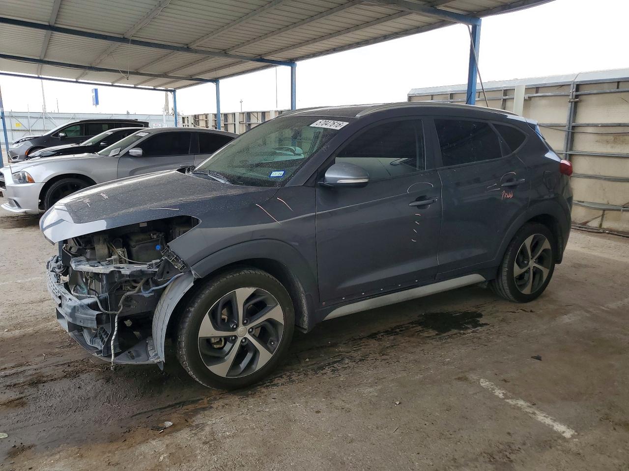 KM8J33A21HU525940 · 2017 HYUNDAI TUCSON