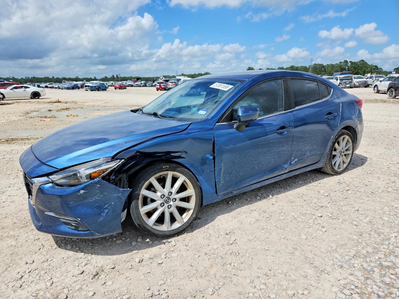 JM1BN1W35H1100554 · 2017 MAZDA 3