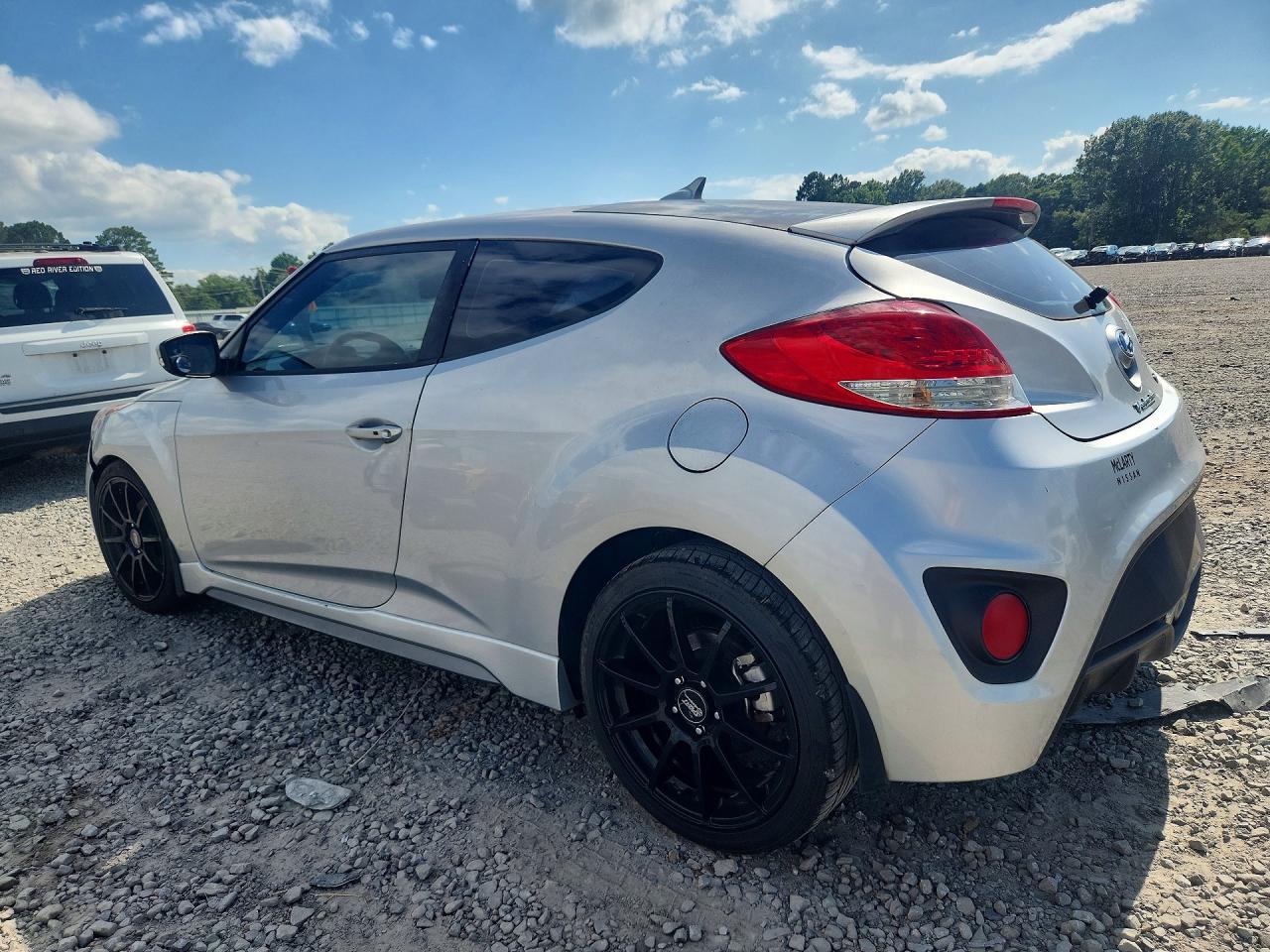 KMHTC6AEXGU302640 · 2016 HYUNDAI VELOSTER · 2/12
