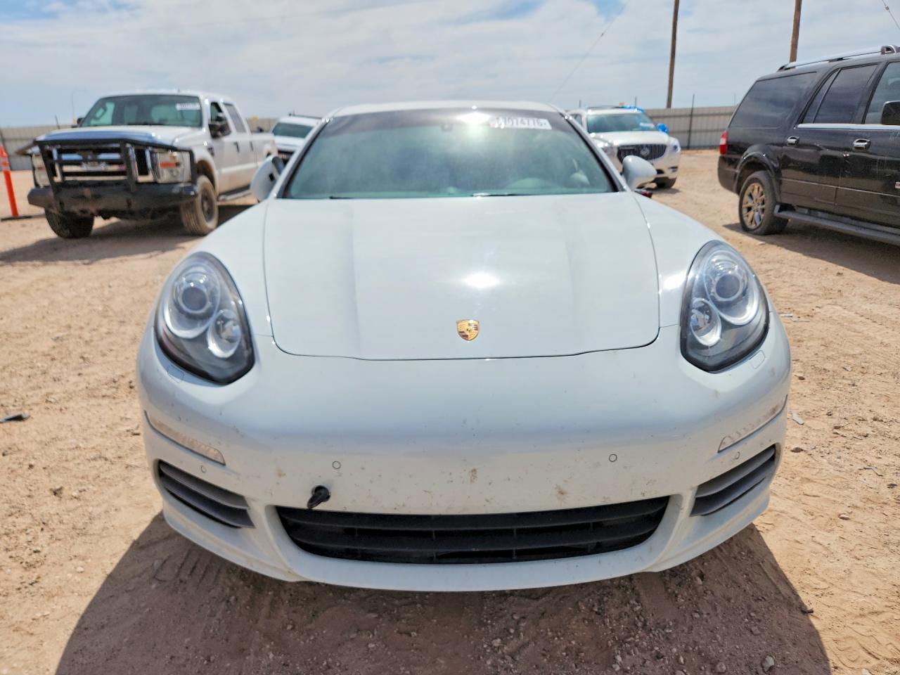 WP0AA2A79GL005201 · 2016 PORSCHE PANAMERA · 5/12