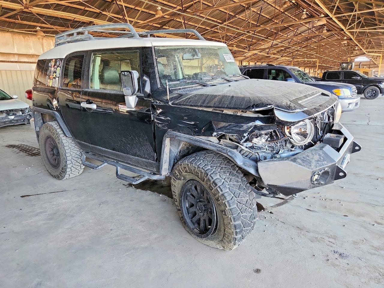 JTEBU4BF1CK132761 · 2012 TOYOTA FJ CRUISER · 4/13