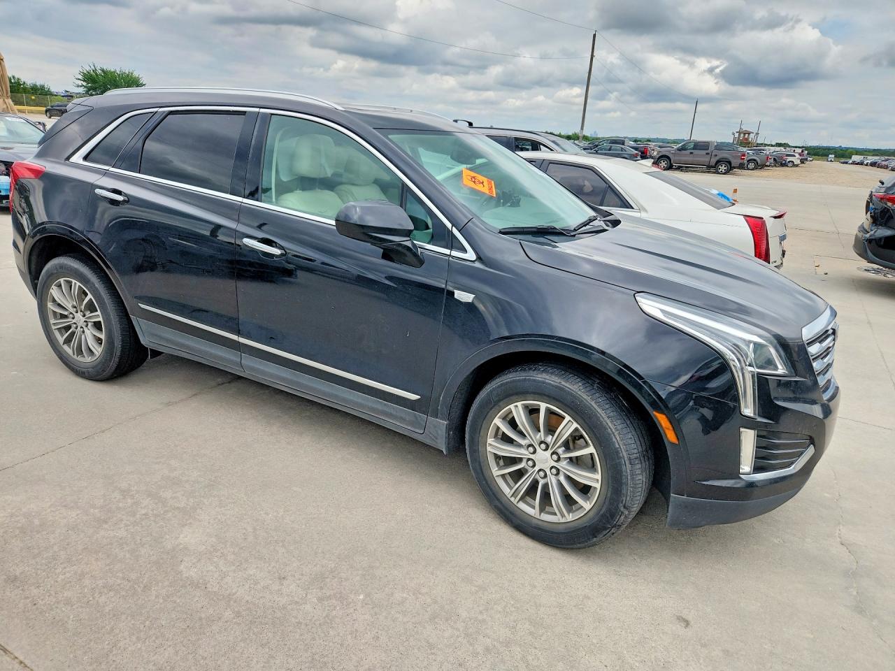 1GYKNBRSXHZ123560 · 2017 CADILLAC XT5 · 4/13
