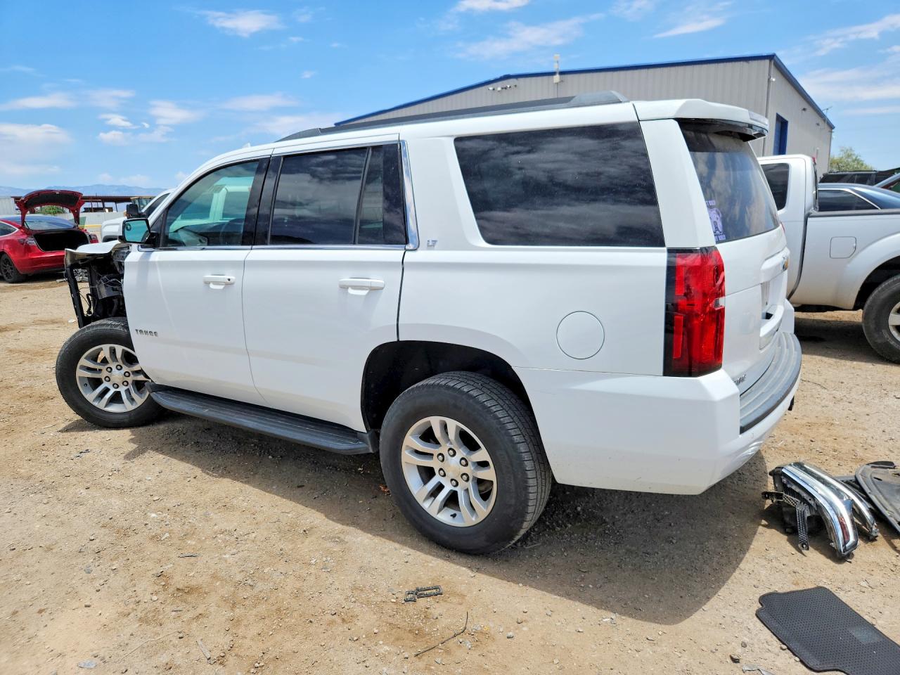 1GNSKBKCXKR395994 · 2019 CHEVROLET TAHOE · 2/14