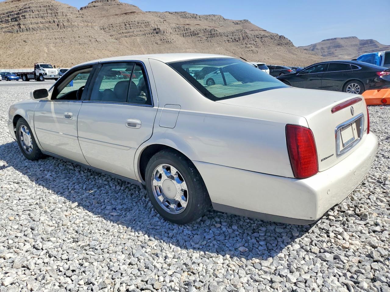1G6KD54Y8YU316571 · 2000 CADILLAC DEVILLE · 2/12