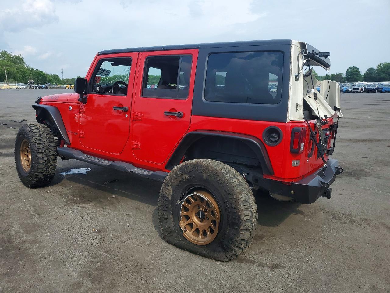 1C4BJWDG5JL869936 · 2018 JEEP WRANGLER UNLIMITED · 2/12