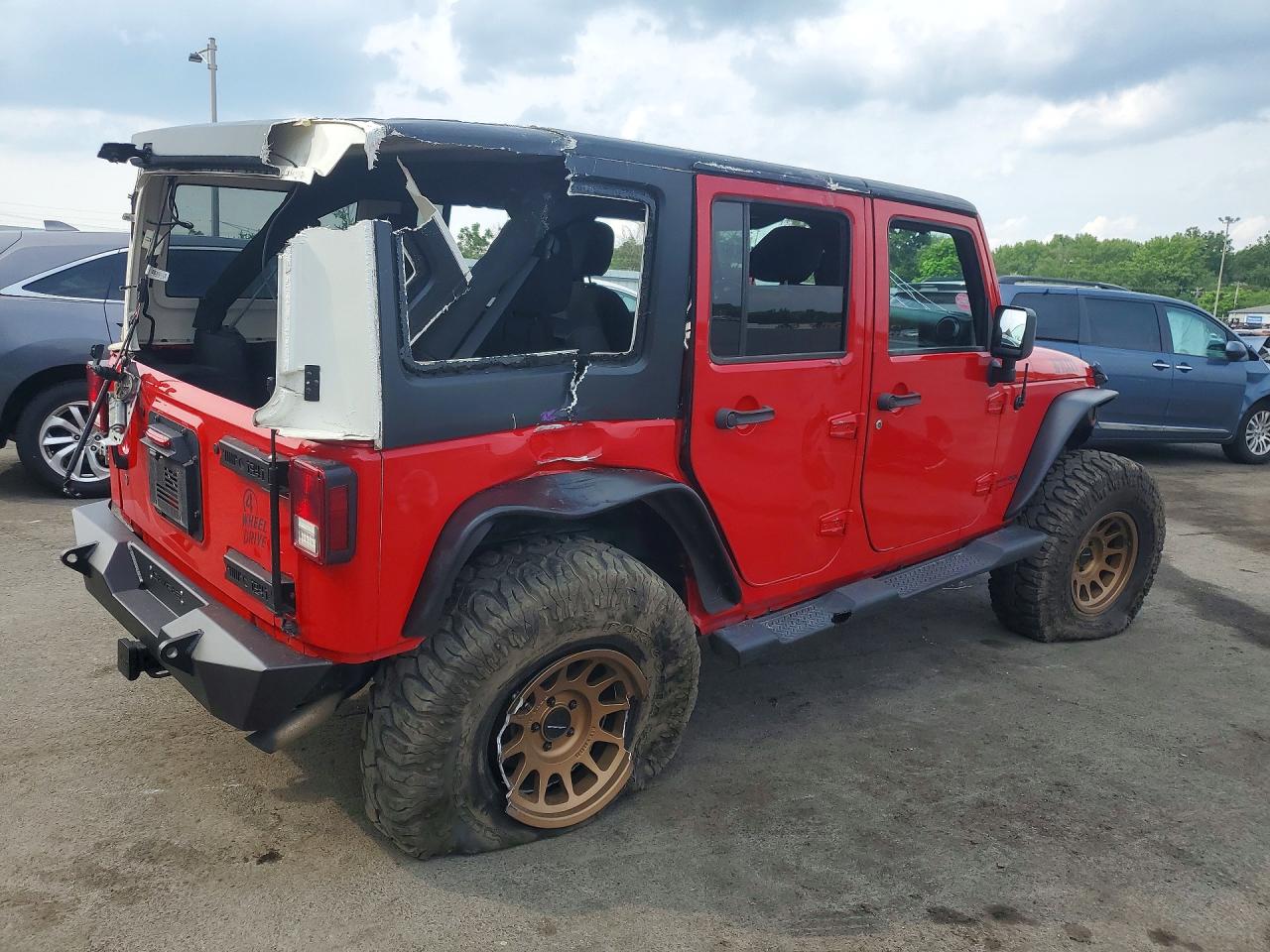1C4BJWDG5JL869936 · 2018 JEEP WRANGLER UNLIMITED · 3/12