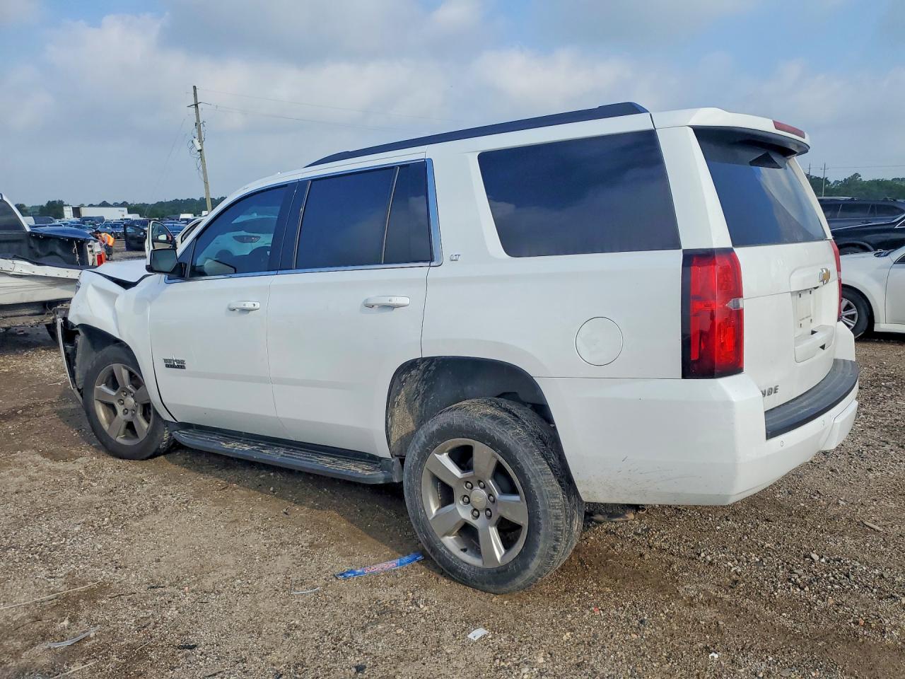 1GNSCBKC1KR178220 · 2019 CHEVROLET TAHOE · 2/13