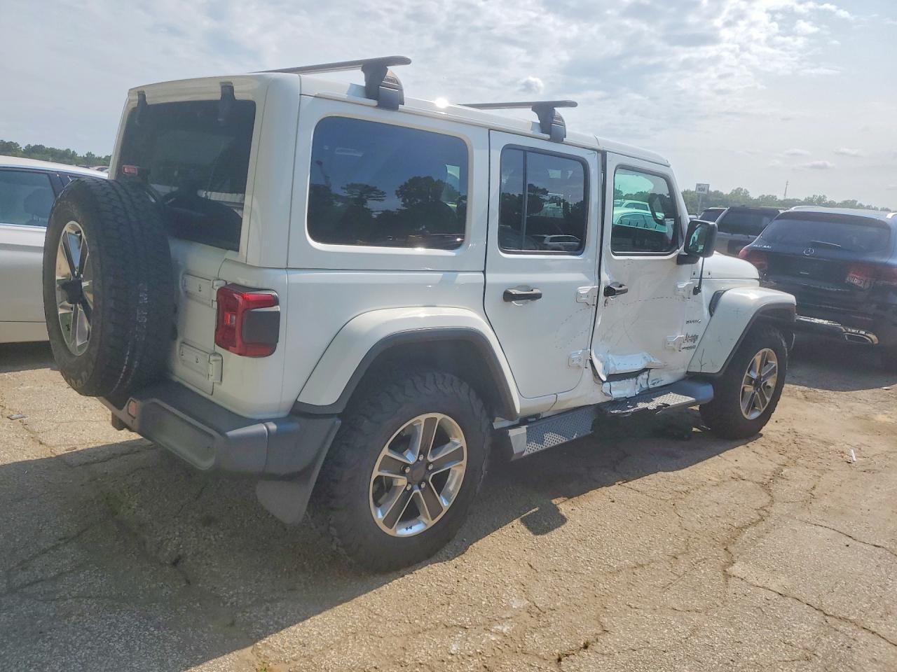 1C4HJXEG5JW125685 · 2018 JEEP WRANGLER UNLIMITED · 3/12