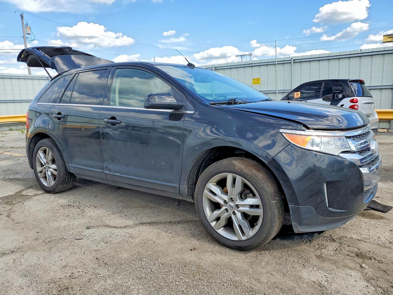 2FMDK4KC7CBA52850 · 2012 FORD EDGE · 4/13