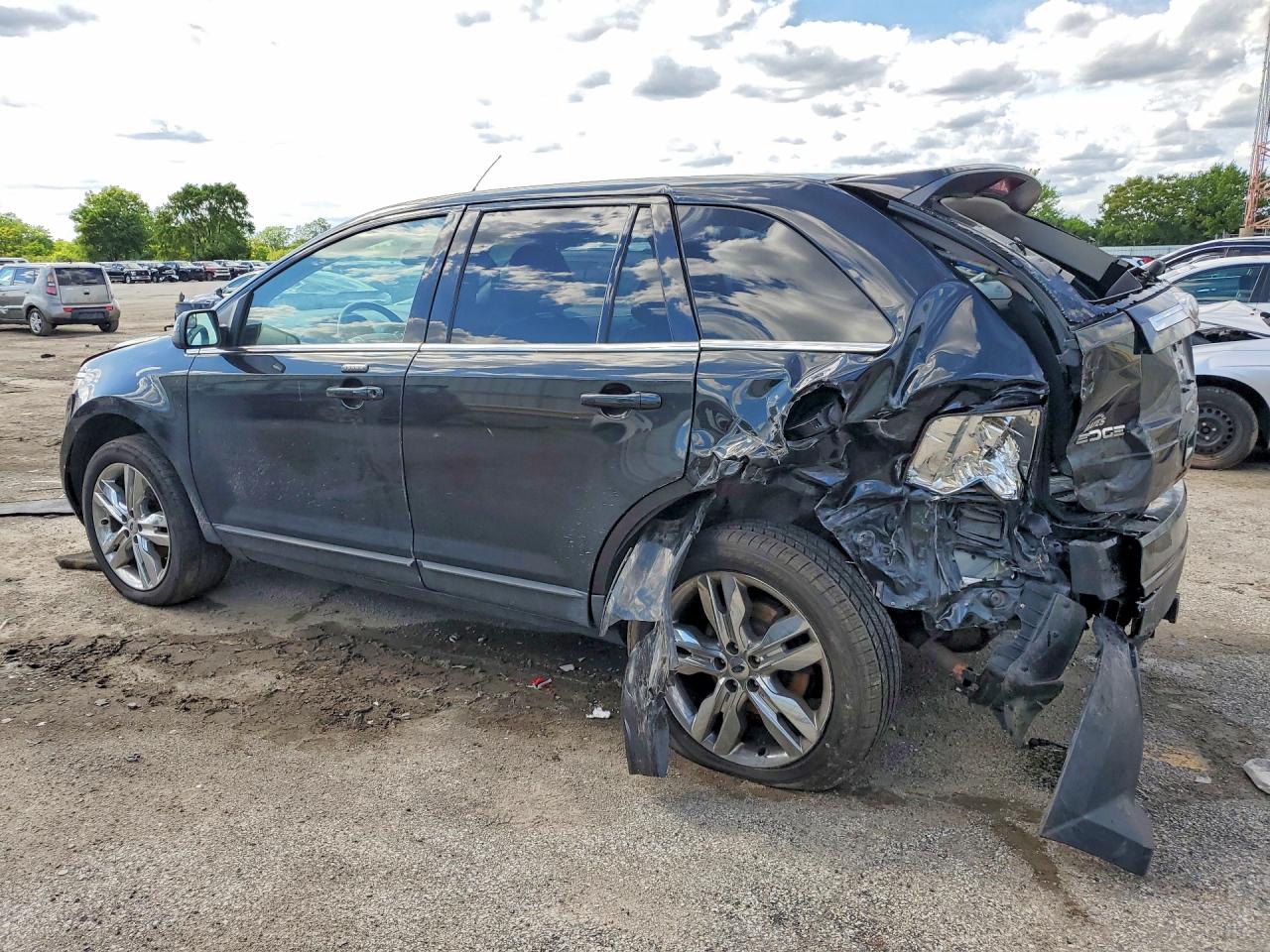 2FMDK4KC7CBA52850 · 2012 FORD EDGE · 2/13