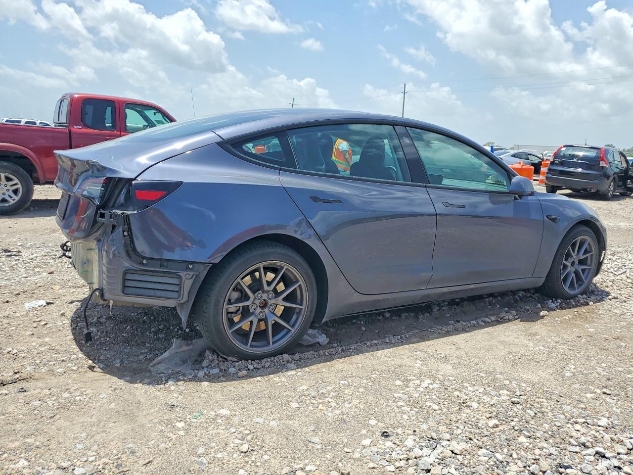 5YJ3E1EA3PF585271 · 2023 TESLA MODEL 3 · 3/13