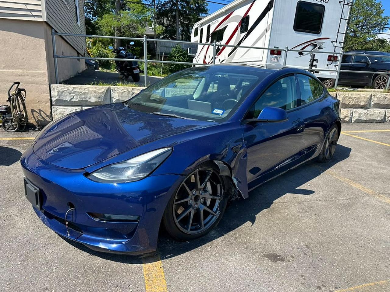5YJ3E1EA1PF385831 · 2023 TESLA MODEL 3