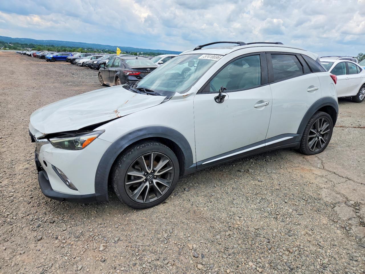 JM1DKBD75G0123222 · 2016 MAZDA CX-3