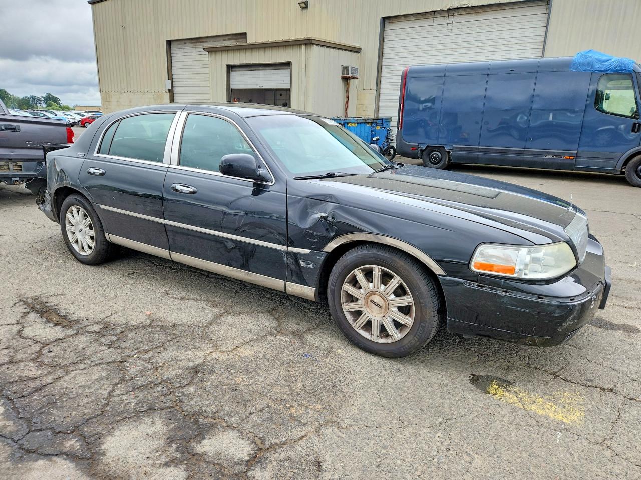 2LNHM82V99X603523 · 2009 LINCOLN TOWN CAR · 4/12