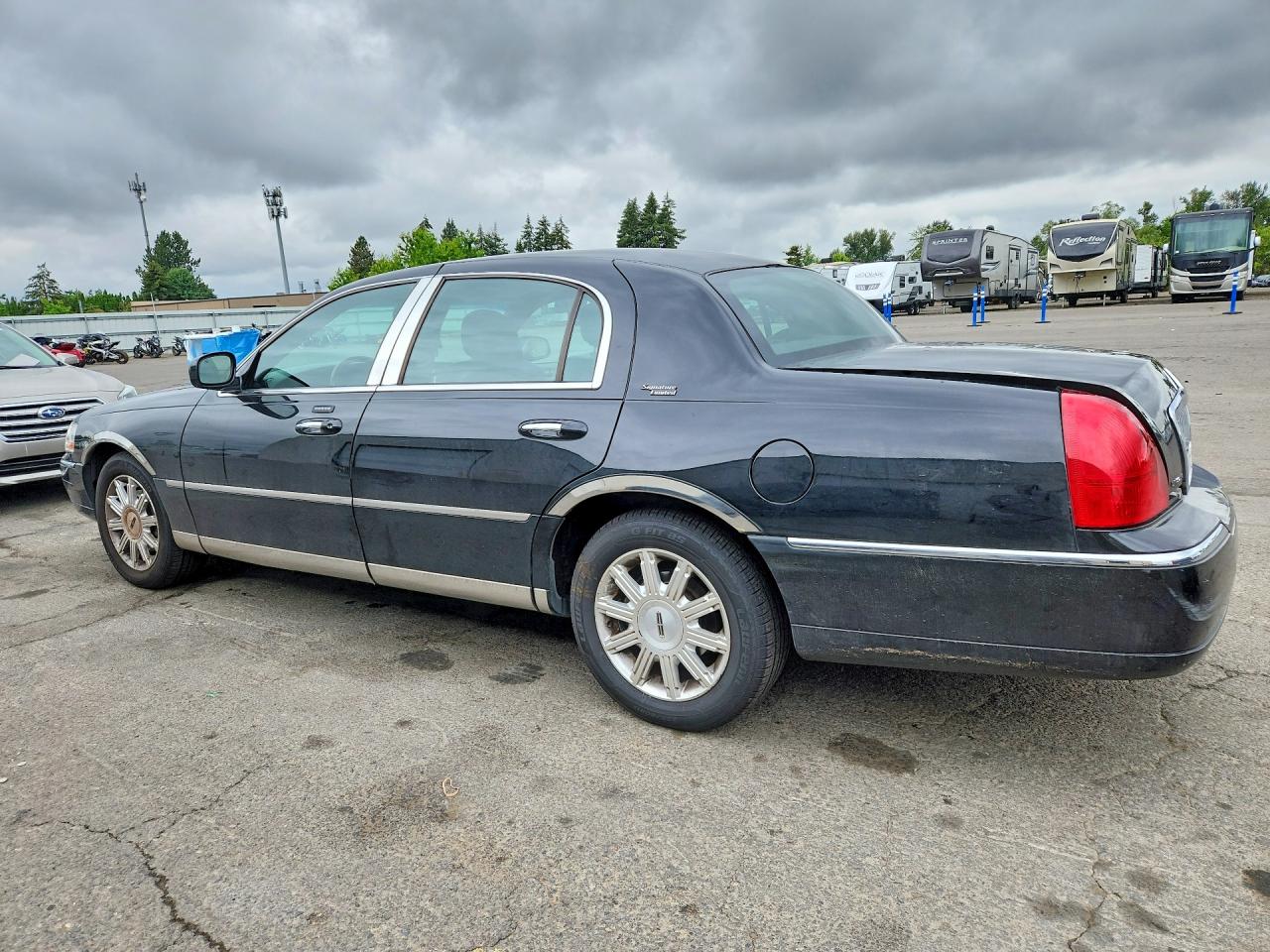 2LNHM82V99X603523 · 2009 LINCOLN TOWN CAR · 2/12