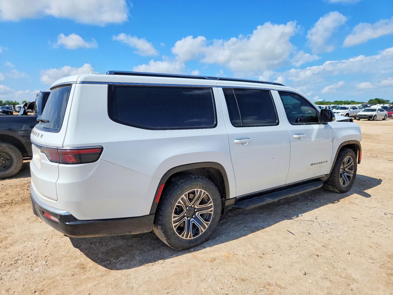 1C4SJSAPXPS511873 · 2023 JEEP WAGONEER · 3/14