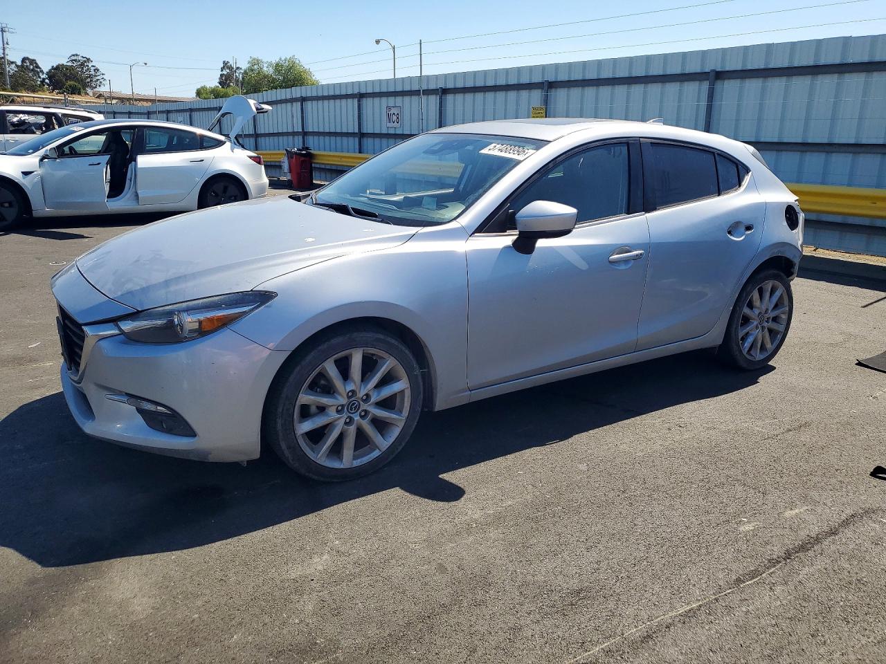JM1BN1M37H1116564 · 2017 MAZDA 3