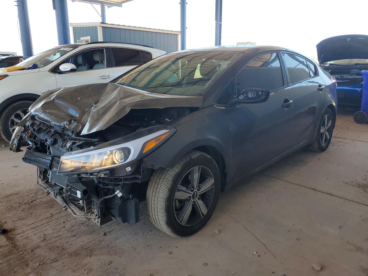 3KPFL4A75JE188897 · 2018 KIA FORTE