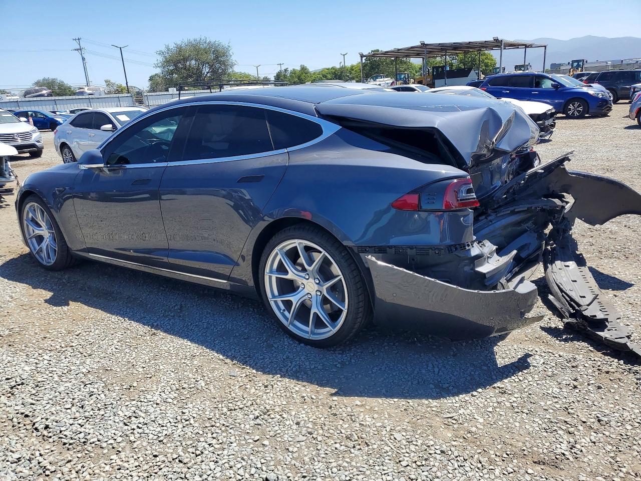 5YJSA1E22JF265270 · 2018 TESLA MODEL S · 2/12