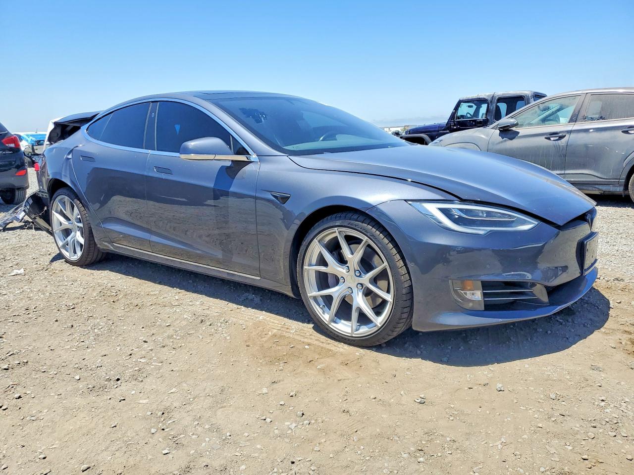 5YJSA1E22JF265270 · 2018 TESLA MODEL S · 4/12
