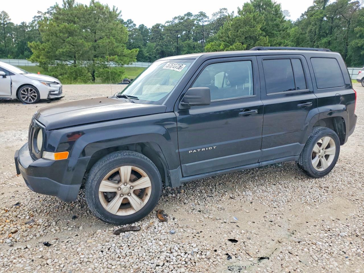 1C4NJPFA7CD704690 · 2012 JEEP PATRIOT