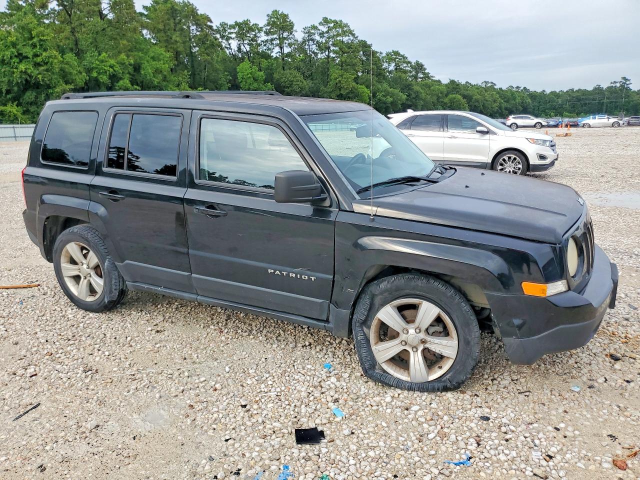 1C4NJPFA7CD704690 · 2012 JEEP PATRIOT · 4/13