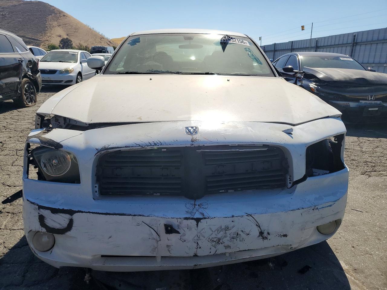 2B3CA3CV9AH259328 · 2010 DODGE CHARGER · 5/12