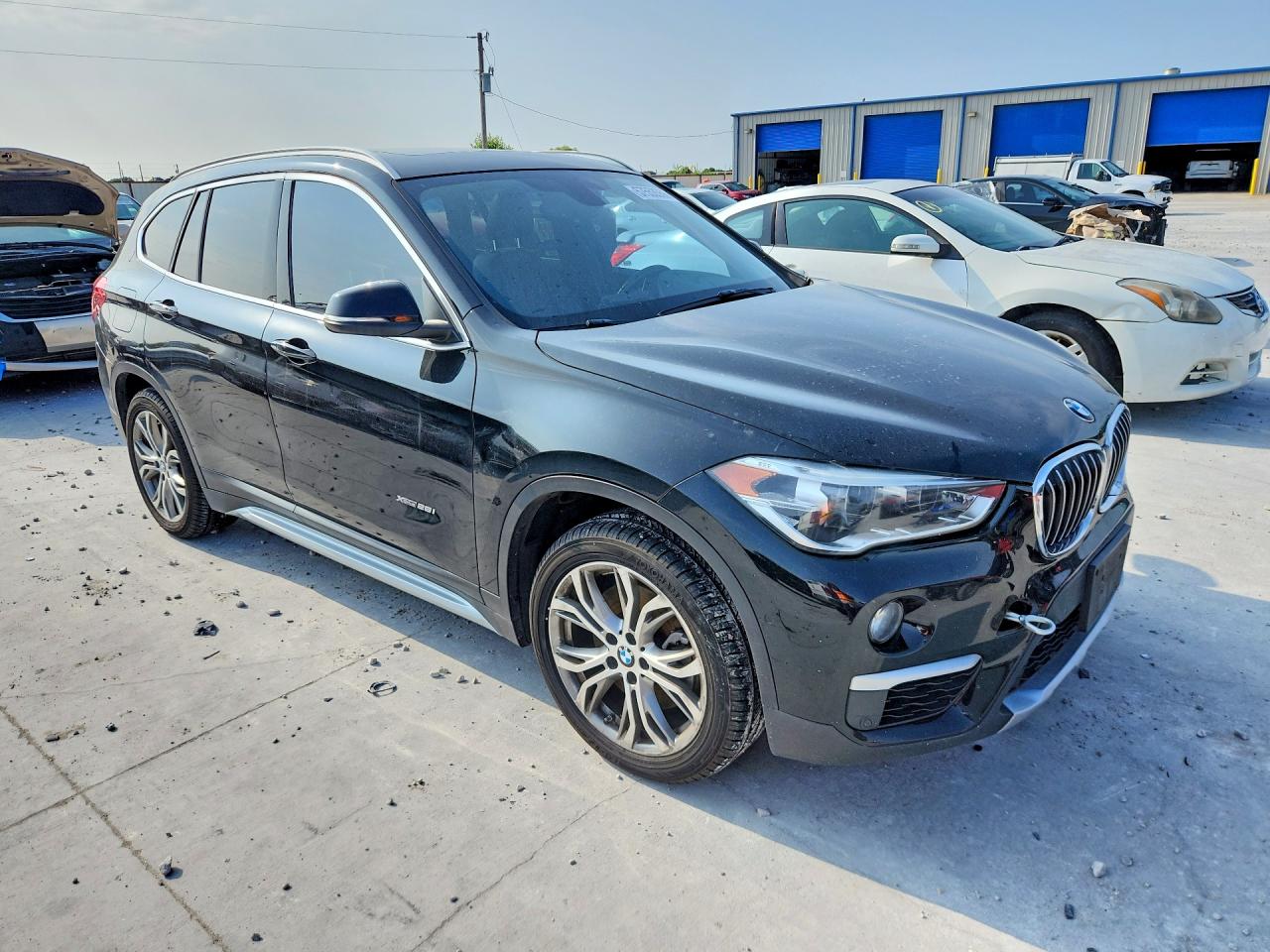 WBXHT3Z30H4A53655 · 2017 BMW X1 · 4/13