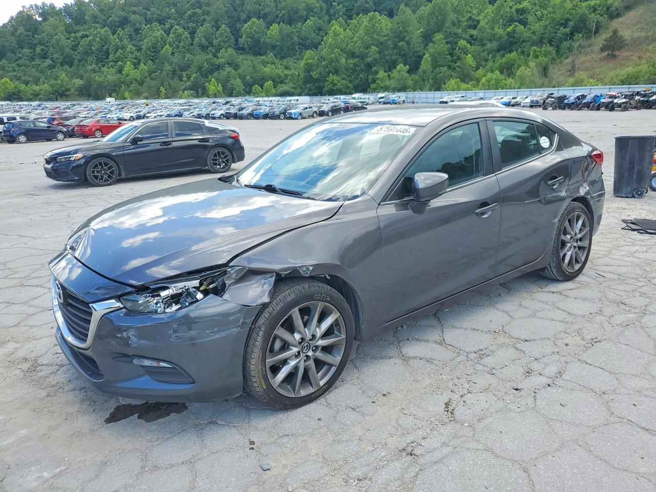 3MZBN1V32JM251701 · 2018 MAZDA 3