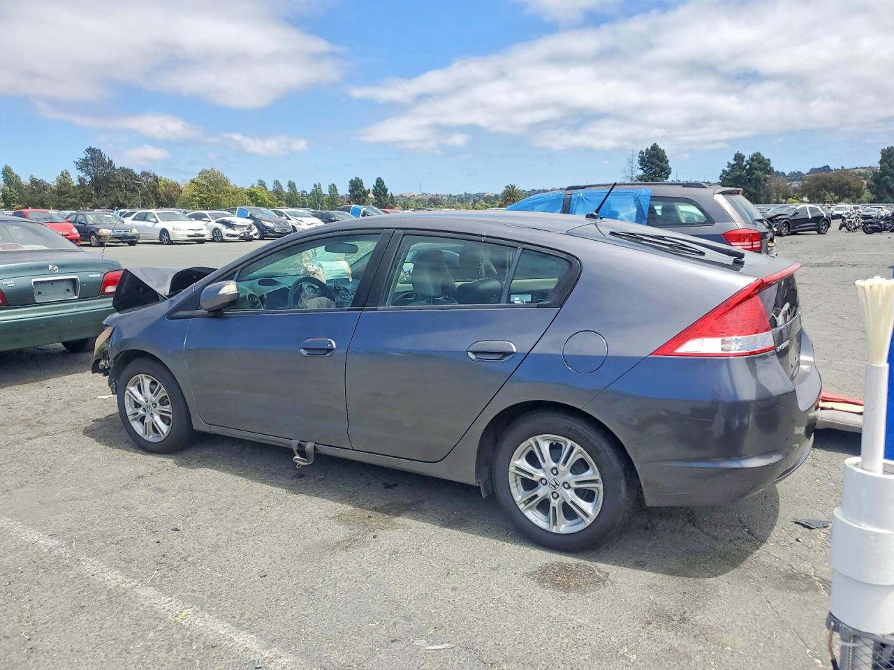 JHMZE2H79AS010858 · 2010 HONDA INSIGHT · 2/12
